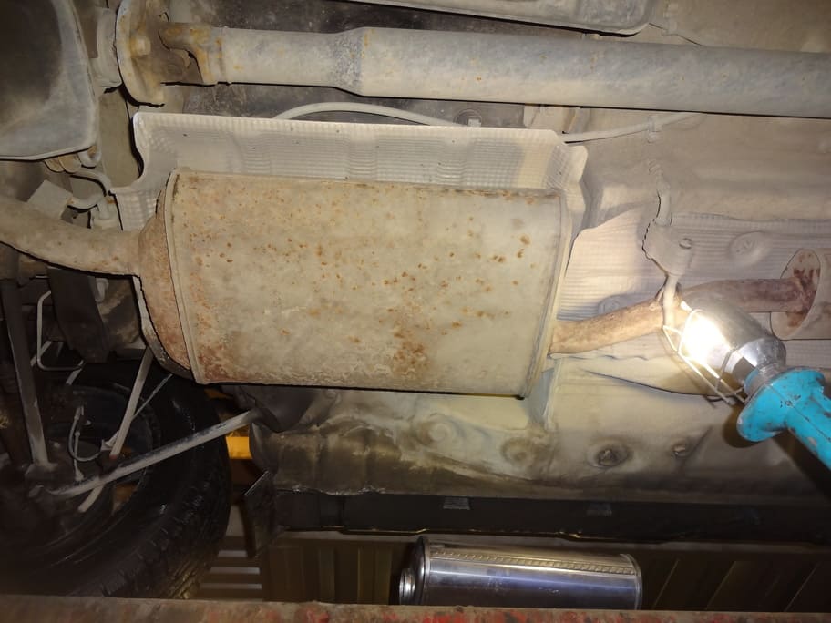 Старый глушитель.